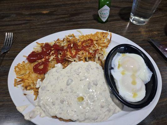 Hash browns poached eggs and chicken fried steak