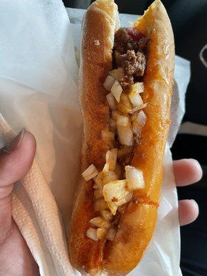 Chili Dog with cheese and onions.