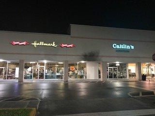Our two stores at night