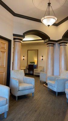 What a luxurious waiting room with comfortable chairs.