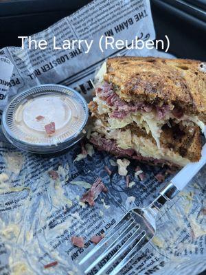 Their Reuben with their own brisket, sauerkraut and secret sauce. They are generous with the portion and gives all the yums.