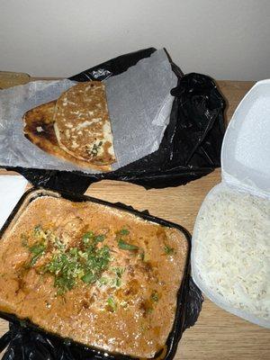 Butter Chicken Curry (of cashew nut sauce) with Rice.