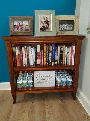 A lending library as you walk into the office.