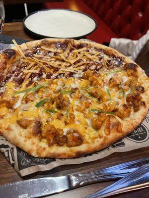 Half Bang Bang Cauliflower and half BBQ chicken pizza