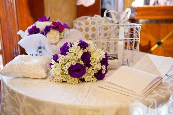 Bridal bouquet and arrangement made by Bowman Dahl for my daughter's wedding.