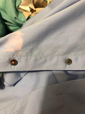 Brand new shirt brought in to be pressed and this is how I get it back. They say not their fault