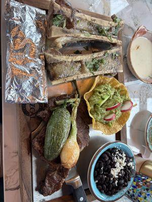 Bone marrow and a half inch ribeye