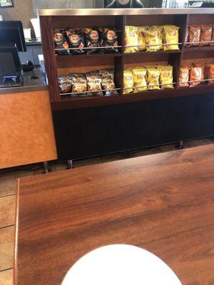 Order at one end then walk down to the other to pay the same person you just ordered from... smart