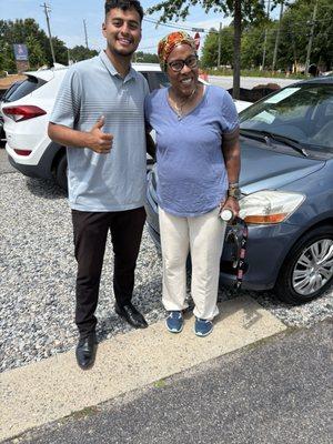 Anthony and I with my child's car.