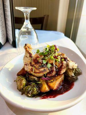 Chef's special: Airline Chicken breast with fried brussel sprouts, rosemary potato wedges, and a cherry balsamic reduction.
