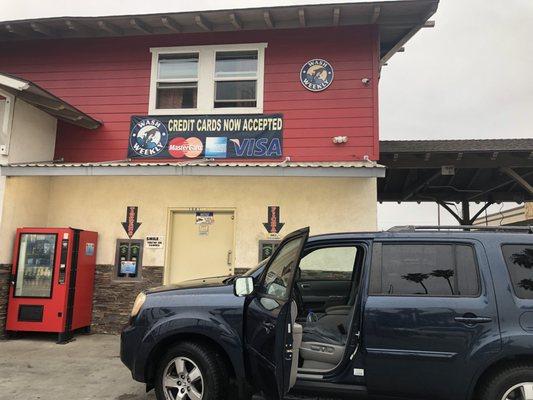 My car with soap still dripping from it and not dried. And also the door where I was knocking. You can also see the unit upstairs.