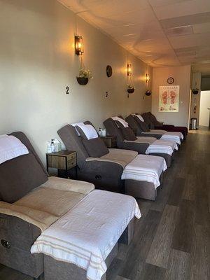 Super nice clean comfy chairs for massage in bigger room