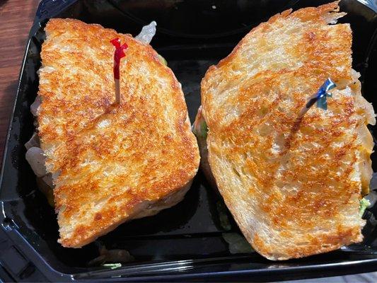 Char burger with cheese and sourdough "bun"