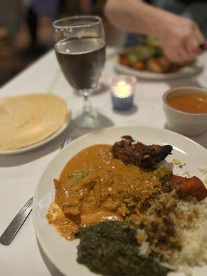 An assortment from their buffet. Fish, chicken tandoori, butter chicken, rice, Sag Paneer. Tomato soup!