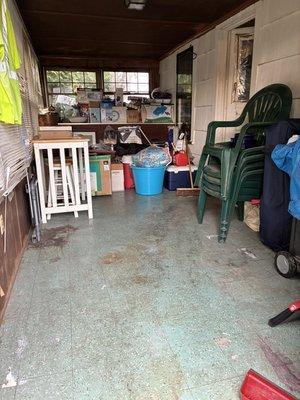 The same porch cleared of all the junk