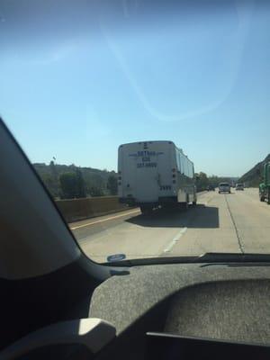 These dirtbags think it's acceptable and legal to drive their buses in the fast lane and hold up traffic