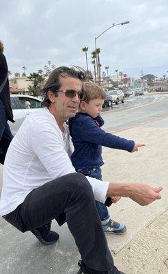 Alex, hair master with his little client and friend after haircut)