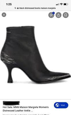 The only image I could find (blurry) that shows what they looked like originally. The distressing was OBVIOUSLY a design choice.