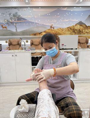 Getting a nice massage while wearing a mask