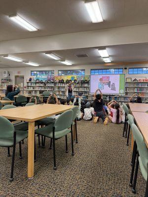 Cute little first graders,  learning how to meet and greet dogs