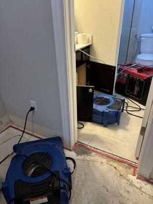 Water damage  mitigation leak in bathroom