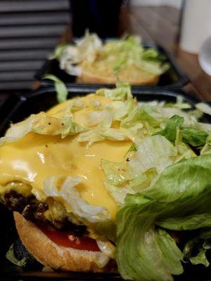 Dirty Bird with American cheese, lettuce, tomatoes, pickles and dirty bird sauce