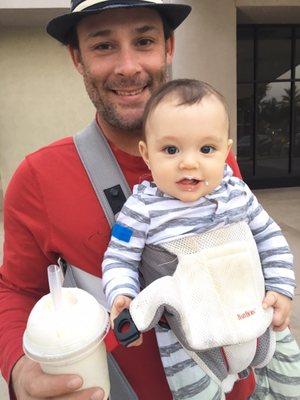 Father and son sharing some piña colada boba