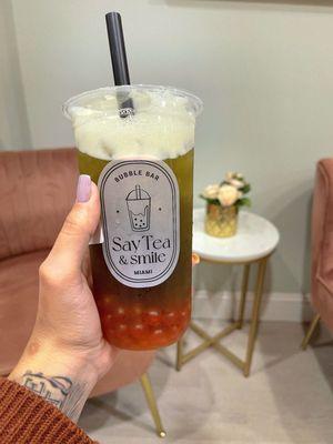 Jasmine Green Tea Latte w/ passion fruit boba