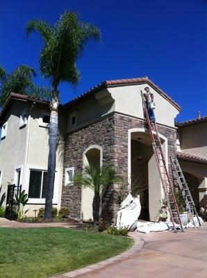 Brushing out the final wood trim on a large home in Steel Canyon.