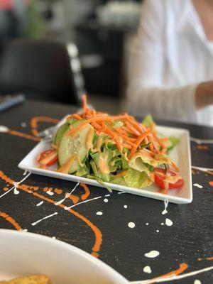 Entree comes with choice of soup or salad.