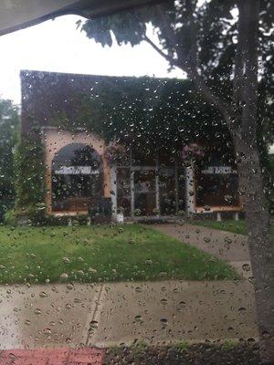 Cute exterior! To the left of Homestyle pizza right where Union and Regent St. cross .