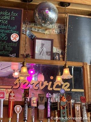 The photo of a sailor above the bar is the owner's Father.