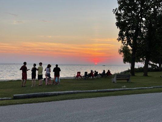 Taking a break from dinner to enjoy the sunset.