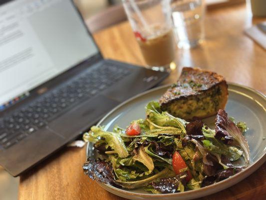 Quiche and slightly overdresssed salad