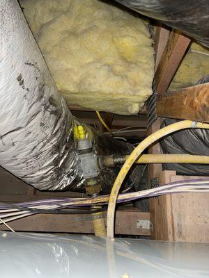 Residential gas leak pinpointed in an attic