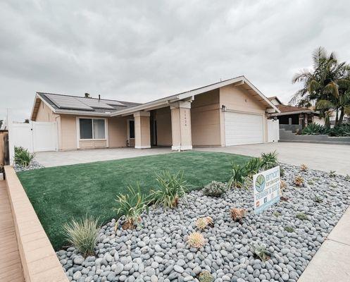 Front yard with low maintenance plants.