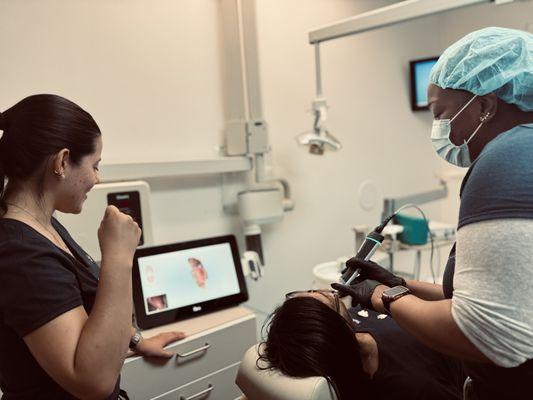 Using the iTero scanner for Invisalign at Manhattan Dental Care.