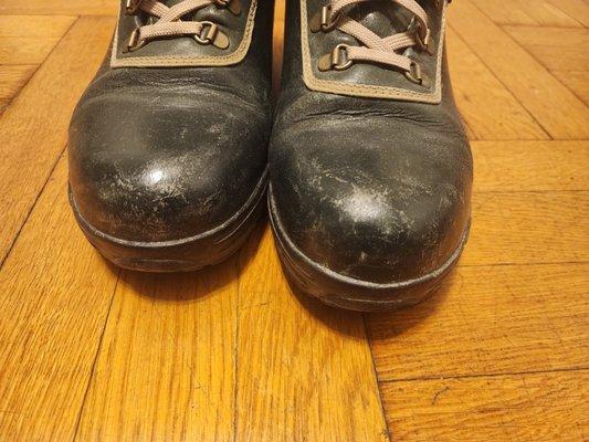 Scratches painted over. Original color of boots are not glossy