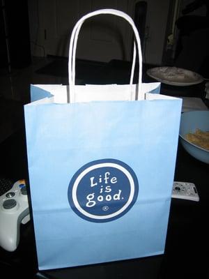 Bag from the store with it's logo