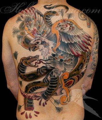 Tattoo by Holly Azzara
eagle vs. snake traditional back piece
