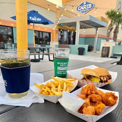 Located alongside Carib Brewery! Can't go wrong, great food and great brews