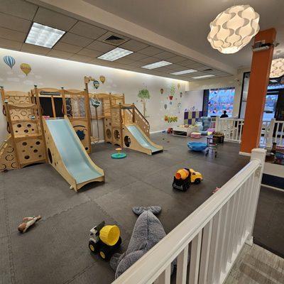Spacious, brightly lit and clean play area.