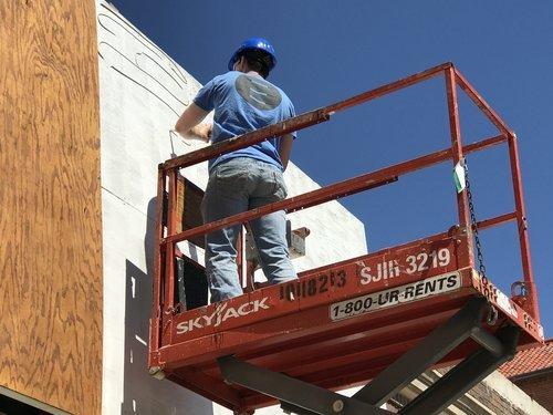 E2 Creative on site installing the exterior facade at a local home goods store in Waco called Gather.
