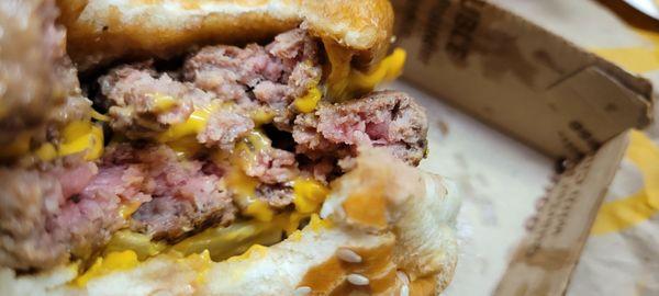 Raw double Quarter pound with cheese. Raw and still cold.