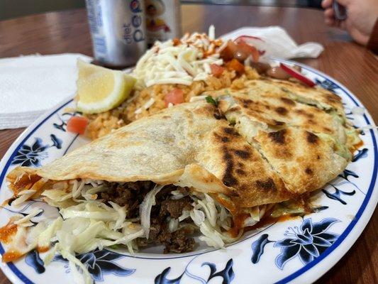 Asada quesadilla plate with beans and rice