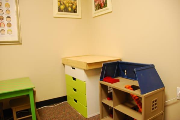 Playroom with sand-tray and doll house