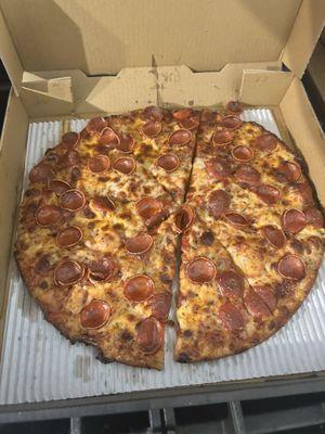 The Pepperoni Madness with thin crust.