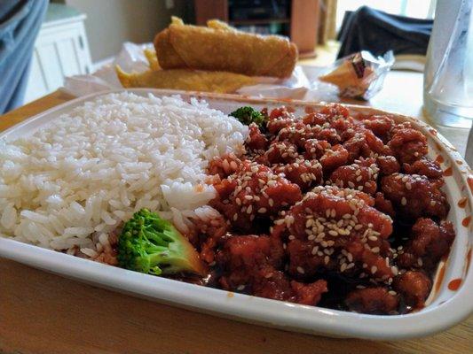 Sesame chicken combo plate, (comes with white or fried rice and an egg roll.)