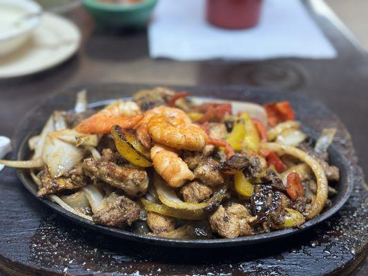 I got the #14 fajita trio - it was only $13.50 for all this, with tortillas, rice, frijoles ranchero & rice!