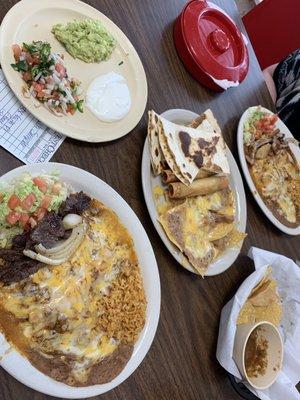 Two Mexican fajita plates, chips & salsa, sampler appetizer.